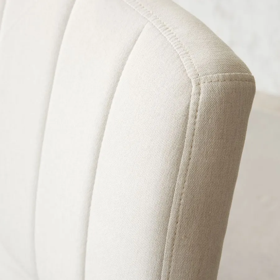 Aiko Chaise de bureau rembourrée beige avec accoudoirs et roulettes